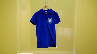 The jersey worn by Brazilian football legend Pele during the 1958 FIFA World Cup final match against Sweden is exhibited during a press preview at the Sotheby's Breuer building in New York, on July 1, 2026. The shirt will be put to auction as part of the 