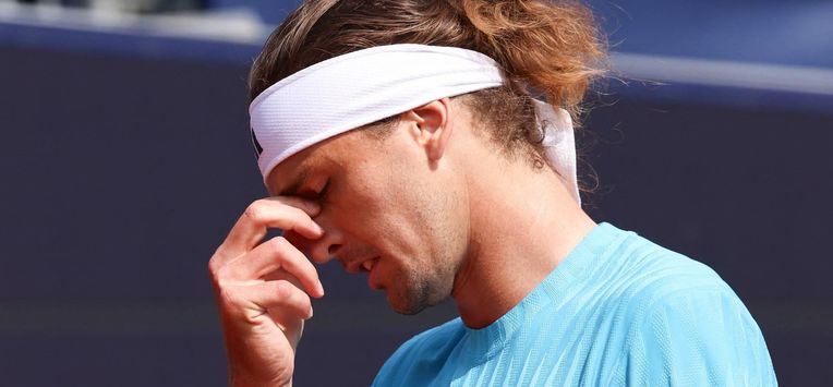 Germany's Alexander Zverev reacts during his men's singles semi-final match against Italy's Flavio Cobolli at the ATP Munich Open tennis tournament in Munich, southern Germany on April 18, 2026. 
Alexandra BEIER / AFP