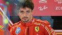 Ferrari's Monegasque driver Charles Leclerc reacts as he stands in the pits ahead of the first practice session ahead of the Abu Dhabi Formula One Grand Prix at the Yas Marina Circuit in Abud Dhabi on December 6, 2024. 
Andrej ISAKOVIC / AFP
