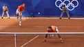 epa11509808 Tallon Griekspoor and Wesley Koolhof of the Netherlands in action during the Men's Doubles second round match against Rafael Nadal and Carlos Alcaraz of Spain at the Tennis competitions in the Paris 2024 Olympic Games, at the Roland Garros in Paris, France, 30 July 2024.  EPA/RITCHIE B. TONGO