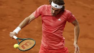epa11304411 Stefanos Tsitsipas of Greece in action during his men's singles Round of 64 match against  Thiago Monteiro of Brazil at the Madrid Open tennis tournament, Madrid, Spain, 27 April 2024.  EPA/SERGIO PEREZ