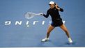 2023-10-08 13:42:33 Poland's Iga Swiatek hits a return to Russia's Liudmila Samsonova during their women’s singles final match of the WTA China Open tennis tournament in Beijing on October 8, 2023. 
PEDRO PARDO / AFP