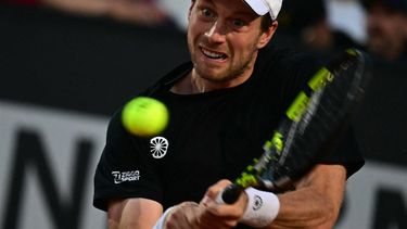 Dutch Botic van de Zandschulp returns to Canada's Felix Auger Aliassime during the Men's ATP Rome Open tennis tournament at Foro Italico in Rome on May 11, 2024.  
Tiziana FABI / AFP