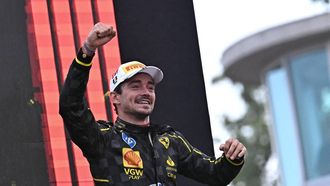 Winner Ferrari's Monegasque driver Charles Leclerc celebrates on the podium after the Italian Formula One Grand Prix race at Autodromo Nazionale Monza circuit, in Monza on September 1, 2024. 
Gabriel BOUYS / AFP