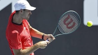 epa11822907 Hubert Hurkacz of Poland in action against Tallon Griekspoor of the Netherlands during their Men's first round match during the Australian Open tennis tournament in Melbourne, Australia, 14 January 2025.  EPA/ROLEX DELA PENA