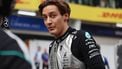 epa13280214 Mercedes driver George Russell of Britain walks in the pit lane as the start of the race is delayed in the 2026 Formula 1 Bahrain Grand Prix at the Sepang International Circuit in Malaysia, in Sepang, Malaysia, 04 October 2026.  EPA/ANNICE LYN / POOL