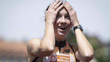 epa11477235 Femke Bol of Netherlands reacts after setting a new European record in the 400 metres hurdles Women during the 44th edition of Resisprint International, at the Stade de la Charriere, in La Chaux-de-Fonds, Switzerland, 14 July 2024.  EPA/ANTHONY ANEX