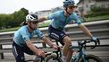 Astana Qazaqstan Team's Dutch rider Cees Bol (R) assists Astana Qazaqstan Team's British rider Mark Cavendish as they cycle in the final kilometres to make it to the finish line inside the cutoff during of the 111th edition of the Tour de France cycling race, 206 km between Florence and Rimini, in Italy, on June 29, 2024. 
Marco BERTORELLO / AFP