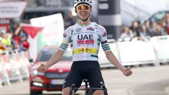 epa11231753 Slovenian rider Tadej Pogacar of UAE Team Emirates celebrates winning the third stage of the Volta Ciclista a Catalunya, a cycling race over 176.7km from Sant Joan de les Abadesses to Port Aine, Spain, 20 March 2024.  EPA/Quique Garcia