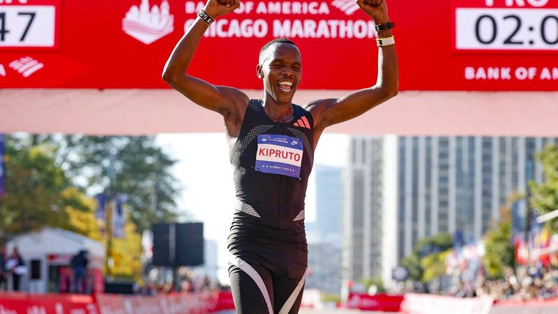 Kenyan runner Amos Kipruto crosses the finish line to win first place in the men's professional division during the 2026 Chicago Marathon in Chicago, Illinois on October 11, 2026.  
KAMIL KRZACZYNSKI / AFP