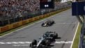 Mercedes' British driver George Russell crosses the finish line as he wins the race, followed by Red Bull Racing's Dutch driver Max Verstappen in second place, during the 2025 Formula 1 Grand Prix du Canada at Circuit Gilles-Villeneuve in Montreal, Canada, on June 15, 2025.  
SHAWN THEW / POOL / AFP