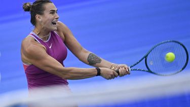 Belarus's Aryna Sabalenka hits a return to Poland’s Magdalena French during their women’s singles quarter-final match at the Wuhan Open tennis tournament in Wuhan, China's Hubei province on October 11, 2024. 
WANG Zhao / AFP