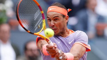Spain's Rafael Nadal returns the ball to Argentina's Pedro Cachin during the third round of the 2024 ATP Tour Madrid Open tournament tennis match at Caja Magica in Madrid on April 29, 2024. 
OSCAR DEL POZO / AFP