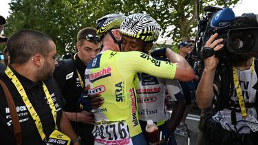 epa11450121 Eritrean rider Biniam Girmay (R) of Intermarche-Wanty celebrates with teammate Dutch rider Mike Teunissen after he wins the the third stage of the 2024 Tour de France cycling race over 230km from Piacenza to Turin, Italy, 01 July 2024.  EPA/TIM DE WAELE / POOL