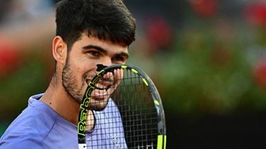 Spain's Carlos Alcaraz reacts during his men's singles final match against Italy's Jannik Sinner for the ATP Rome Open tennis tournament at Foro Italico in Rome on May 18, 2025.  
Tiziana FABI / AFP