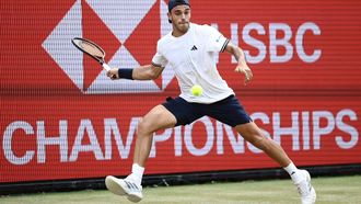 Argentina's Francisco Cerundolo returns to US player Tommy Paul during the men's singles final tennis match on day six of the ATP HSBC Championships at Queen's Club in west London on June 21, 2026. 
Henry NICHOLLS / AFP