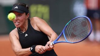 US Jessica Pegula plays a backhand return to US Ann Li during their women's singles match on day 5 of the French Open tennis tournament on Court Philippe-Chatrier at the Roland-Garros Complex in Paris on May 29, 2025. 
ALAIN JOCARD / AFP
