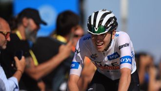 2023-07-09 18:08:58 epa10736396 White Jersey best young rider Slovenian rider Tadej Pogacar of team UAE Team Emirates crosses the finish line of the 9th stage of the Tour de France 2023, a 184kms race from Saint-Leonard-de-Noblat to Puy de Dome, France, 09 July 2023.  EPA/MARTIN DIVISEK