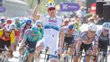 epa12020824 Belgian rider Tim Merlier of team Soudal Quick-Step (C) celebrates winning the Scheldeprijs one-day cycling race over 202.8km from Terneuzen to Schoten, Belgium, 09 April 2025.  EPA/OLIVIER MATTHYS
