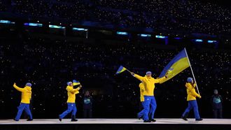 Flagbearer Yelyzaveta Sydorko of Team Ukraine leads the team in the athletes' parade during the opening ceremony of the Milano Cortina 2026 Winter Olympics at San Siro Stadium on February 06, 2026 in Milan, Italy. 
Sarah Stier / POOL / AFP