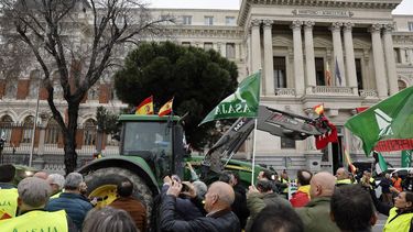 Tractors arrive to block off a street in front of the Agriculture Ministry during a farmers protest on their conditions and the European agricultural policy, in Madrid on February 15, 2024. Angry farmers have been protesting across Europe over rising costs, high fuel prices, bureaucracy and the environmental requirements in the EU's Common Agricultural Policy (CAP) and its forthcoming 