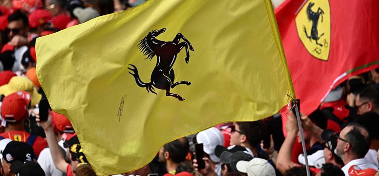 Spectators wave Ferrari banners at the end of the Emilia Romagna Formula One Grand Prix at the Autodromo Enzo e Dino Ferrari race track in Imola on May 19, 2024. 
GABRIEL BOUYS / AFP