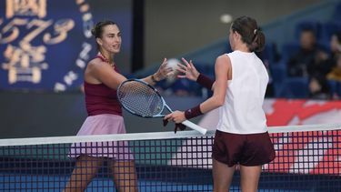 epa13279956 Nikola Bartunkova of Czech Republic (R) celebrates after winning her women’s singles match at the China Open tennis tournament against Aryna Sabalenka (L) of Belarus in Beijing, China, 04 October 2026.  EPA/ANDRES MARTINEZ CASARES