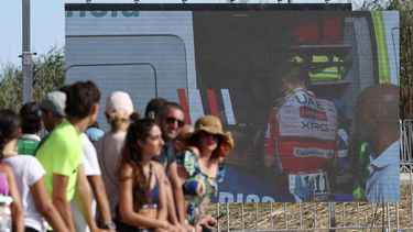 Team UAE's Slovenian rider Tadej Pogacar is seen entering an ambulance after crashing on a giant screen in the finish area of the Vuelta a Espana 2026, a 171 km race between Pucol and Xeraco on August 29, 2026.   Race leader Tadej Pogacar pulled out of the Vuelta a Espana on Saturday after a heavy fall 31km from the finish of a flat stage eight left him with shoulder and face injuries. Pogacar of Team UAE has won five Tour de France titles and a Giro d'Italia and was targeting his first overall victory on the Spanish 21-day race.

Josep LAGO / AFP
