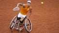 This handout photograph taken and released by OIS/IOC on September 4, 2024, shows Netherlands' Diede De Groot returning the ball against China's Ziying Wang (Not Pictured) during her Women's Singles Semi-final match on the Court Suzanne Lenglen at the Roland-Garros Stadium during the Paris 2024 Paralympic Games. 
Emma Da Silva / OIS/IOC / AFP