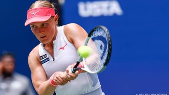 Netherlands' Suzan Lamens plays a return to Poland's Iga Swiatek during their women's singles second round tennis match on day five of the US Open tennis tournament at the USTA Billie Jean King National Tennis Center in New York City, on August 28, 2025. 
Kena Betancur / AFP