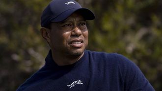 epa11159682 Tiger Woods of the US reacts after hitting the ball on hole 4 tee during the second round of 2024 The Genesis Invitational at The Riviera Country Club in Los Angeles, California, USA, 16 February 2024.  EPA/ETIENNE LAURENT