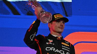 Second-placed Red Bull Racing's Dutch driver Max Verstappen lifts his trophy during podium celebrations following the 2025 Saudi Arabia Formula One Grand Prix at the Jeddah Corniche Circuit on April 20, 2025. 
Gabriel BOUYS / AFP