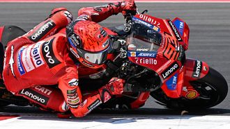 Ducati Lenovo Team's Spanish MotoGP rider Marc Marquez rides during the warm-up ahead of the MotoGP Indonesian Grand Prix at the Mandalika International Circuit in Mandalika, West Nusa Tenggara on October 5, 2025. 
SONNY TUMBELAKA / AFP