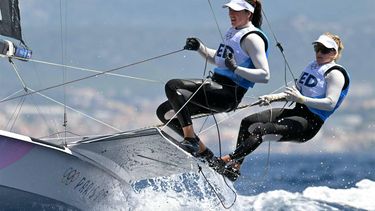 Netherlands' duo Odile Van Aanholt and Annette Duetz compete in Race 9 of the women’s 49erFX skiff event during the Paris 2024 Olympic Games sailing competition at the Roucas-Blanc Marina in Marseille on July 30, 2024.  
NICOLAS TUCAT / AFP