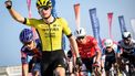 Visma-Lease a Bike team's Netherland rider Olav Kooij celebrates after crossing the finish line to win the first stage of the Tour of Oman cycling race from Bushar to Bimmah Sinkhole, eastern Muscat Governorate, on February 8, 2025. 
Loic VENANCE / AFP