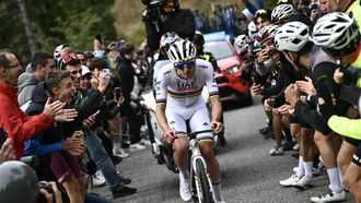 UAE Team Emirates team's Slovenian rider Tadej Pogacar cycles in a lone breakaway in the Colma Di Sormano ascent during the 118th edition of the Giro di Lombardia (Tour of Lombardy), a 252km cycling race from Bergamo to Como on October 12, 2024. 
Marco BERTORELLO / AFP