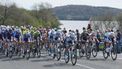 epa11258967 The peloton passes by the UllÃ­barri-Gamboa reservoir during the fourth stage of the Basque Country cycling tour, a 157.5km race from Etzarri Arantz to Legutio, Spain, 04 April 2024.  EPA/Adrian Ruiz Hierro