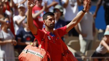 epa11505894 Novak Djokovic of Serbia celebrates after winning the Men's Singles second round match against Rafael Nadal of Spain at the Tennis competitions in the Paris 2024 Olympic Games, at the Roland Garros in Paris, France, 29 July 2024.  EPA/FRANCK ROBICHON