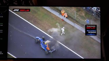 This photograph shows Williams' US driver Logan Sargeant leaving his car after a crash, seen on a screen during the third practice session at The Circuit Zandvoort, western Netherlands, on August 24, 2024, ahead of the Formula One Dutch Grand Prix. The Formula One Zandvoort Grand Prix race will take place on August 25, 2024.
JOHN THYS / AFP