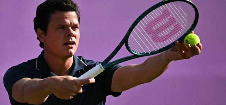 Canada's Milos Raonic prepares to serve against US player Taylor Fritz during their men's singles round of 16 match at the Cinch ATP tennis Championships at Queen's Club in west London on June 19, 2024. 
Ben Stansall / AFP