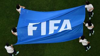 The FIFA flag is displayed on the pitch ahead of the start of the Qatar 2022 World Cup Group F football match between Belgium and Morocco at the Al-Thumama Stadium in Doha on November 27, 2022.  
Kirill KUDRYAVTSEV / AFP