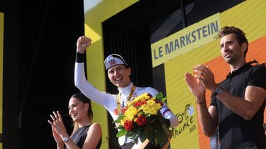 2023-07-22 17:31:40 epa10762433 Slovenian rider Tadej Pogacar of team UAE Team Emirates celebrates on the podium after winning the 20th stage of the Tour de France 2023, a 134kms from Belfort to Le Markstein Fellering, France, 22 July 2023.  EPA/MARTIN DIVISEK
