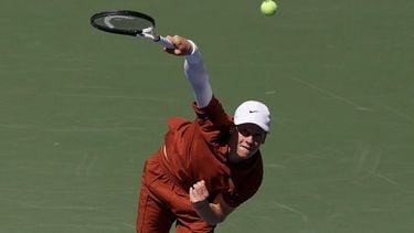 Italy's Jannik Sinner serves to Czech Republic’s Vit Kopriva during their men's singles first round tennis match on day three of the US Open tennis tournament at the USTA Billie Jean King National Tennis Center in New York City, on August 26, 2025. 
TIMOTHY A. CLARY / AFP