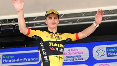 2023-05-19 17:04:16 Team Jumbo-Visma's Dutch rider Olav Kooij celebrates on the podium after winning the fourth stage of the 