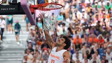 Netherlands' #13 Dimeo van der Horst goes for the basket in the men's pool round 3x3 basketball game between the Netherlands and France during the Paris 2024 Olympic Games at La Concorde in Paris on August 1, 2024. 
David GRAY / AFP