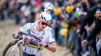 Dutch Mathieu Van Der Poel competes in the men's elite race of the 'Duinencross' cyclocross cycling event, stage five of the X2O Badkamers Trophy (Trofee Veldrijden) competition, in Koksijde, western Belgium, on January 4, 2024. 
JASPER JACOBS / Belga / AFP