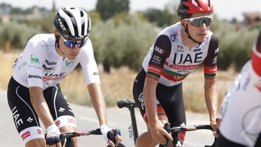 2022-08-31 11:06:37 epa10149501 Portuguese rider Joao Almeida (R) of UAE Team Emirates with his teammate Juan Ayuso (L) during the eleventh stage of La Vuelta cycling race between Alhama de Murcia to Cabo de Gata, of 191 kilometers, in Murcia, eastern Spain, 31 August 2022.  EPA/Javier Lizon