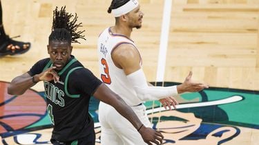 epa12101370 Boston Celtics guard Jrue Holiday (L) gestures following a three point shot as he passes New York Knicks guard Josh Hart (R) during the fourth quarter of the Eastern Conference Semifinals game five between the Boston Celtics and the New York Knicks in Boston, Massachusetts, USA, 14 May 2025. The New York Knicks lead the best of seven series 3-2.  EPA/CJ GUNTHER  SHUTTERSTOCK OUT