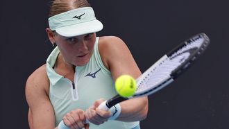 epa11825277 Suzan Lamens of Netherlands in action during the Women's round 2 match against Belinda Bencic of Switzerland at the Australian Open tennis tournament in Melbourne, Australia, 15 January 2025.  EPA/ROLEX DELA PENA