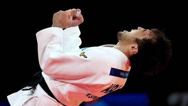 epa11500282 Yeldos Smetov of Kazakhstan celebrates after beating Luka Mkheidze of France in the Men -60kg gold medal fight of the Judo competitions in the Paris 2024 Olympic Games, at the Champs-de-Mars Arena in Paris, France, 27 July 2024.  EPA/DANIEL IRUNGU